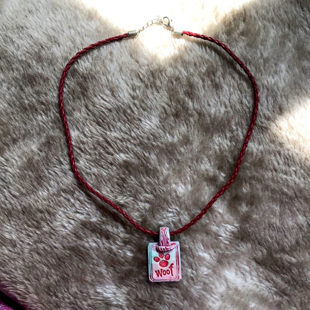 Necklace with paw charm